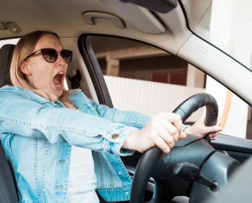 How Do I Know If My Brakes Need Changing? Lady In car With Brake Problems